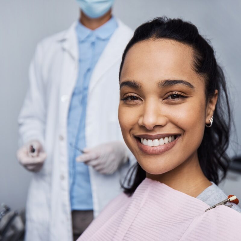 Portrait of a young woman having dental work done on her teeth